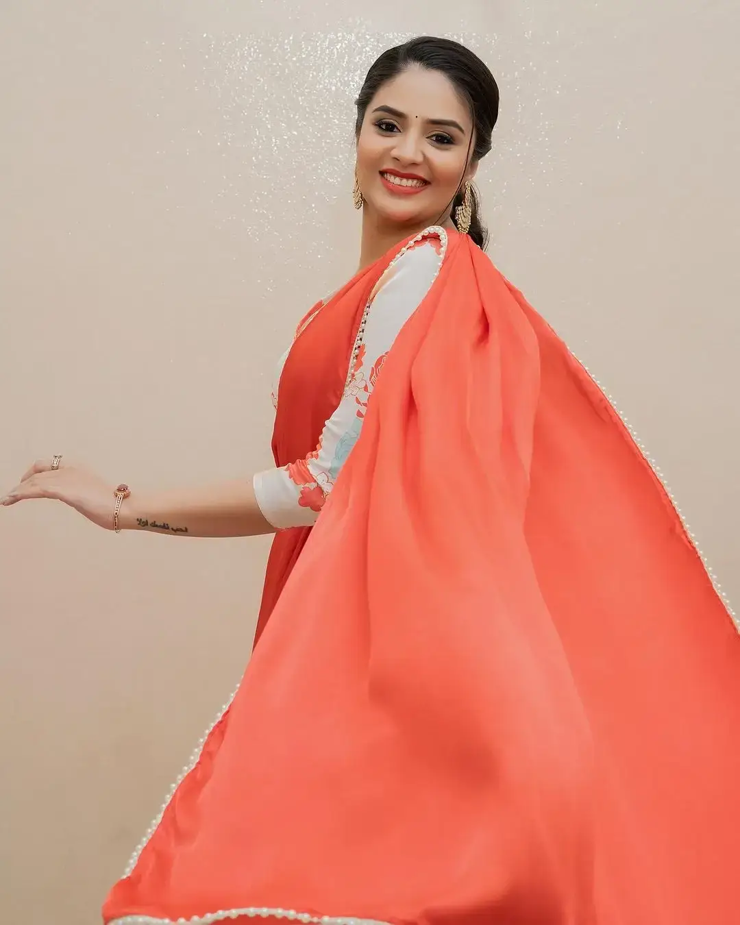 Beautiful Indian Actress Sreemukhi in Orange Lehenga Choli